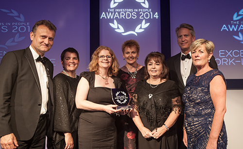Allstate NI accepts the Excellence in Work Life Balance Award in the first Investors in People Awards.