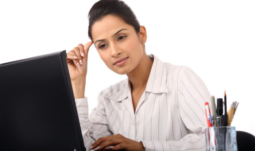 An Allstate customer uses her computer to find out the different options for car insurance