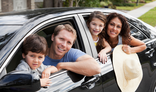 Family ready to enjoy a summer road trip