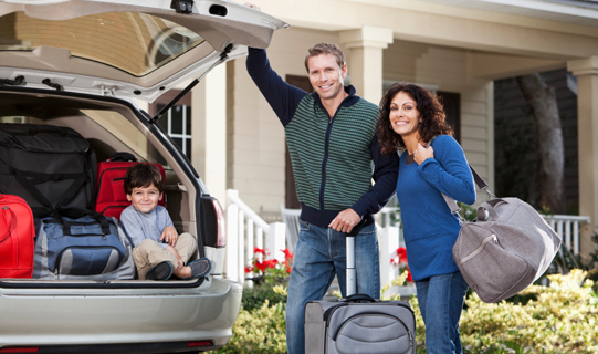 Family packs vehicle for a road trip