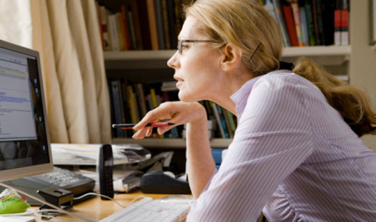 Woman reading information about her online quote