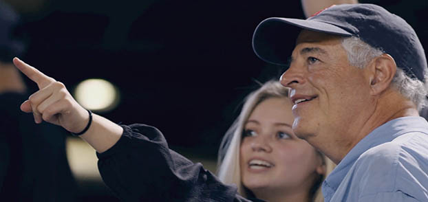 Allstate agent in the stands with phones. 