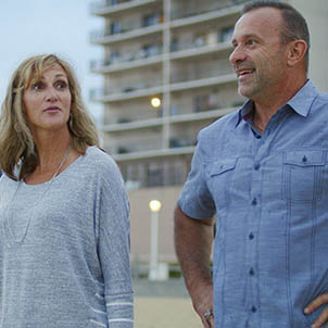 Allstate Agent Ralph on a beach.