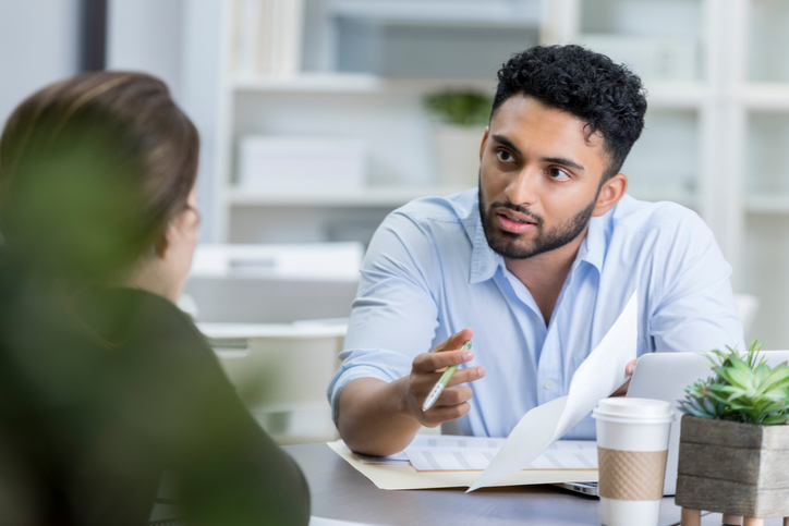 Two people talking.