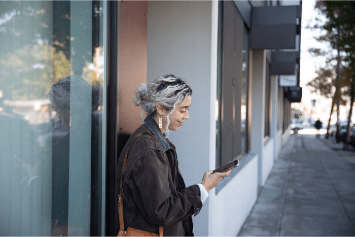 Woman looking at phone.