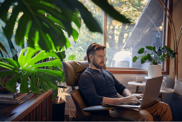 Man on laptop.