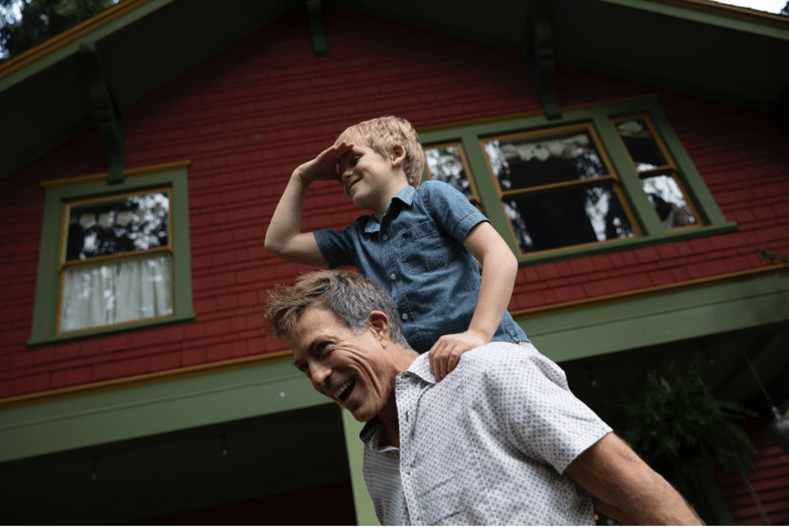 Man and child playing.