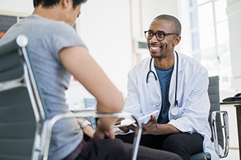Doctor speaking with a patient