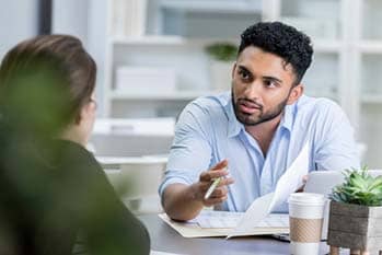 Two people talking.