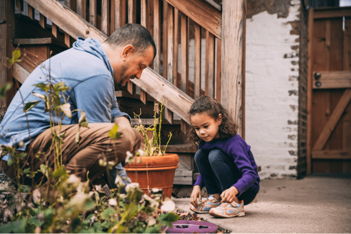 Man and child gardening. 