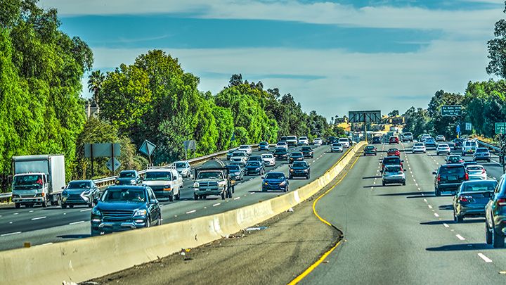image of cars driving on interstate. 