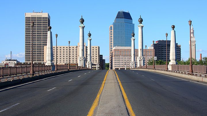 image of tall city buildings from road. 