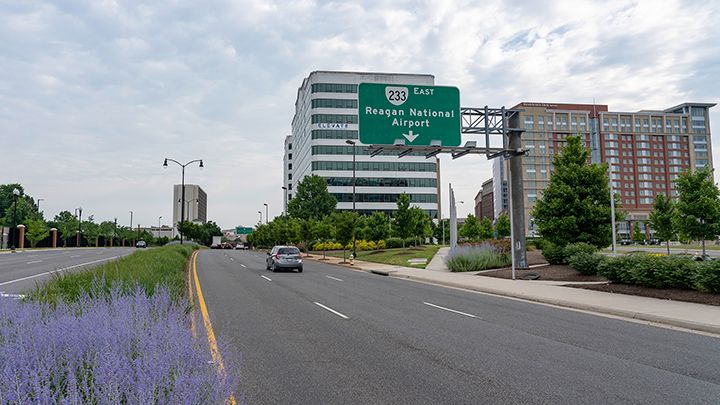 image of road sign and building. 