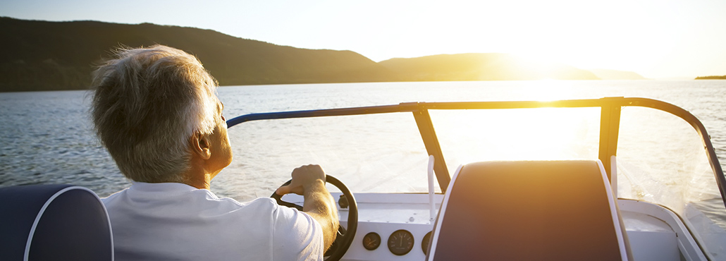 Shilotte men on a boat.