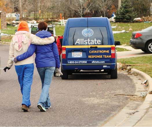Allstate catastrophe employee hugging customer. 