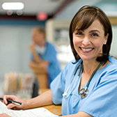 Nurse smiling at hospital. 