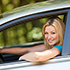Teen driving silver car. 