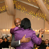 Groom dancing with his mother at wedding. 