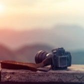 DSLR camera sitting on a ledge. 