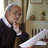 Man reading document. 