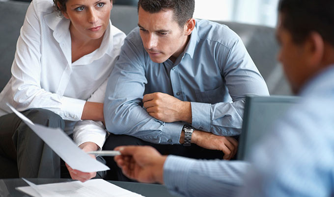 Couple meeting with business man looking over Chula Vista Allstate Life Insurance Policies for Life Insurance Coverage