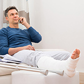 Man and woman making calls after a car crash. 