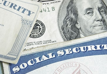 Social security cards and money. 