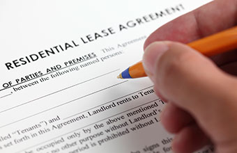A person filling out an application form